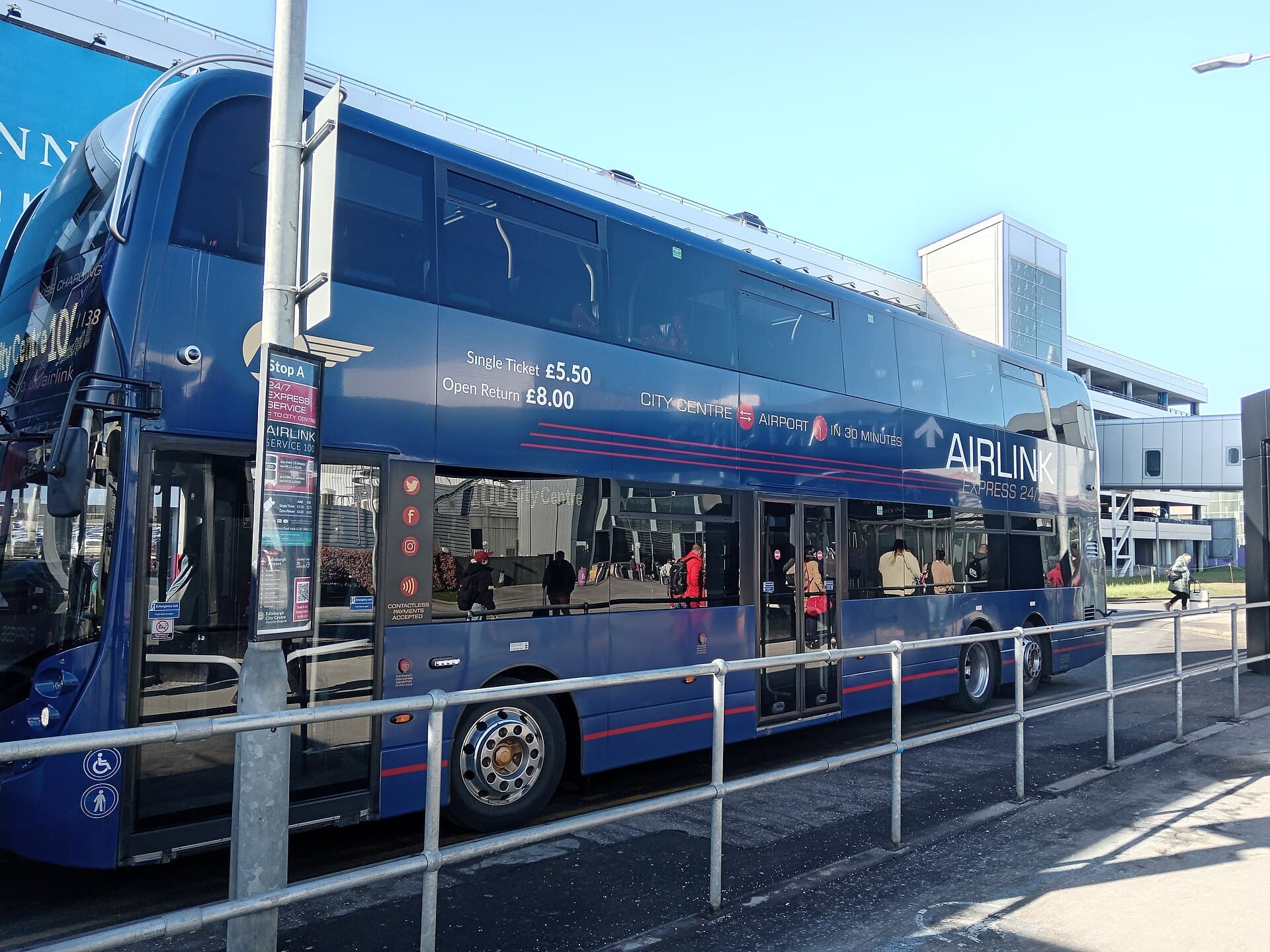 Lothian Buses Airlink 100 airport express bus, its side advertising a £5.50 single and £8.00 open return