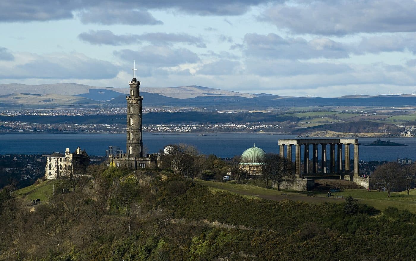 The monuments on Calton Hill in Edinburgh, with the columns of the National Monument and the tower of the Nelson Monument above the city